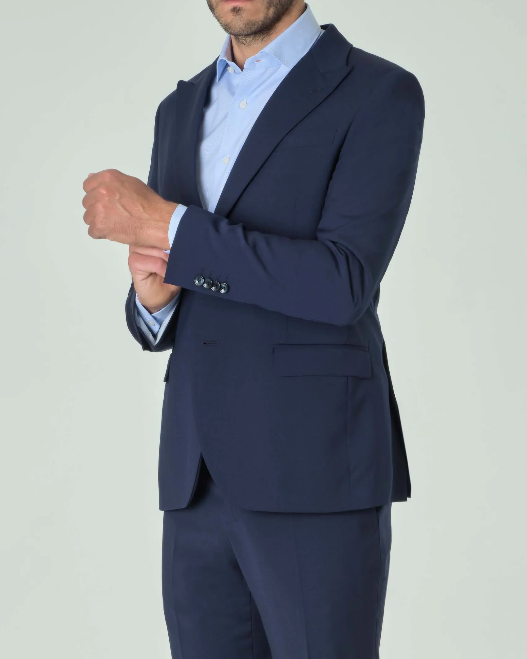 Abito Paul Baker blu in tela di lana stretch con rever a lancia