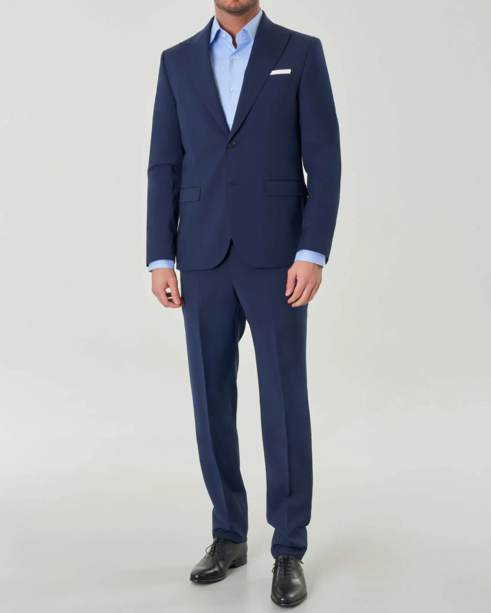 Abito Paul Baker monopetto blu slim-fit in tela di misto lana stretch con rever a lancia