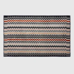 Asciugamano Bernard in spugna di cotone a fantasia chevron bianco nero e coccio