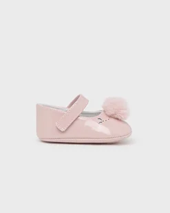 Ballerine in vernice rosa con pompon