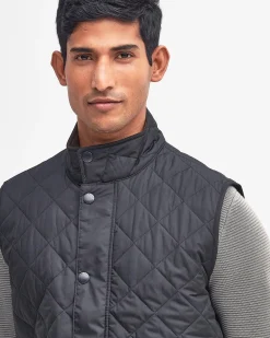 Barbour Gilet Lowerdale blu trapuntato a rombi con colletto in velluto marrone