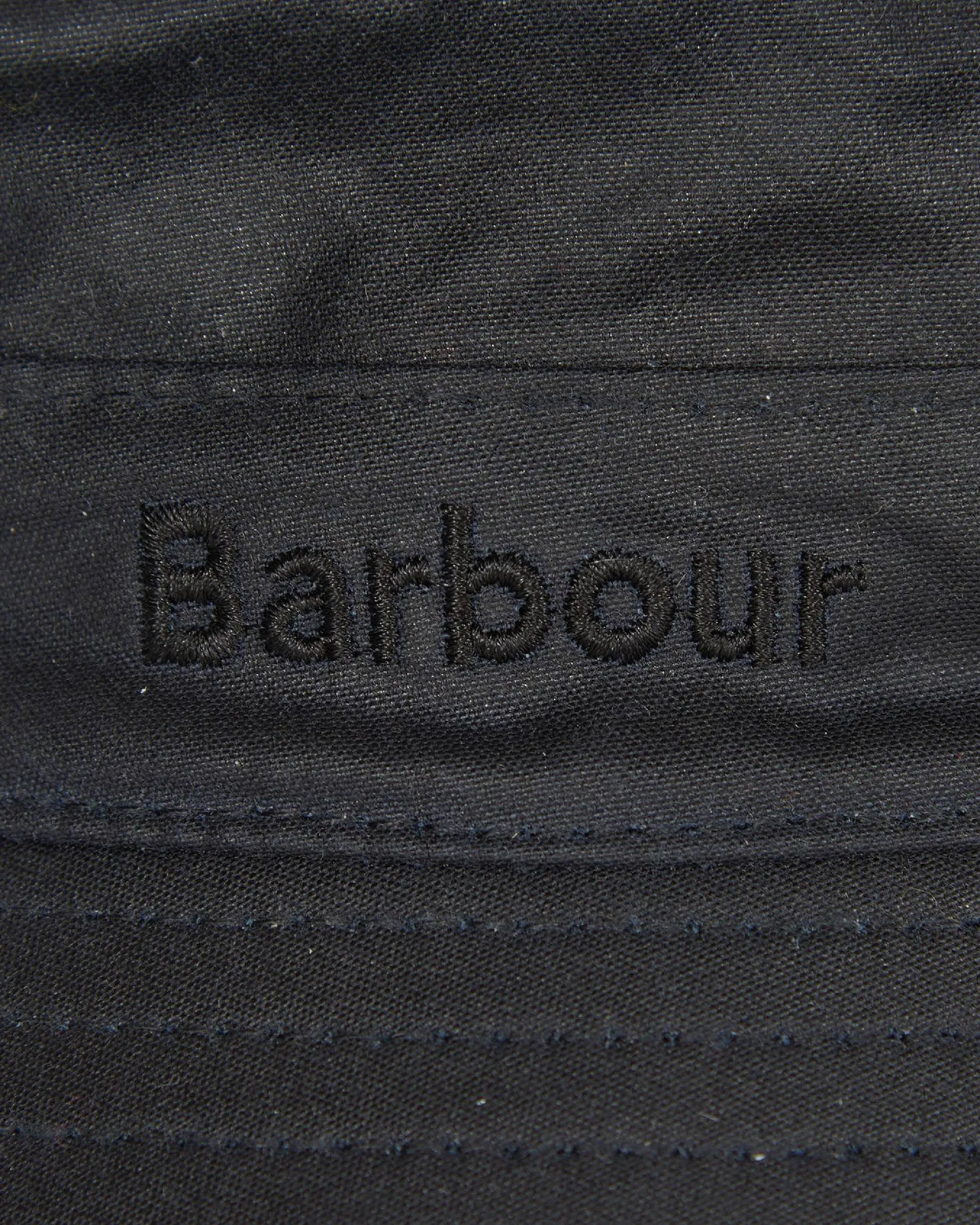 Berretto Barbour blu a pescatore in cotone cerato