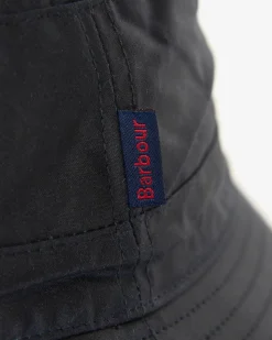 Berretto Barbour blu a pescatore in cotone cerato
