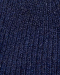 Berretto Barbour blu in lana con risvolto e logo patch applicato
