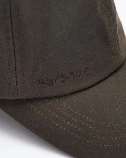 Berretto Barbour verde militare in cotone cerato con frontino