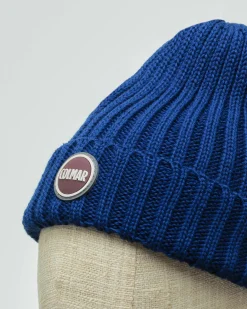 Berretto Colmar Originals blu royal in lana a coste inglesi con logo bollo applicato