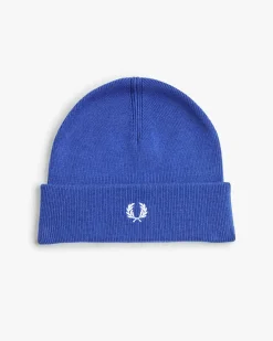 Berretto Fred Perry blu royal in misto lana e cotone con risvolto e corona d'alloro ricamata