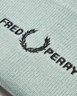 Berretto Fred Perry verde acqua in misto lana e cotone con risvolto e logo ricamato