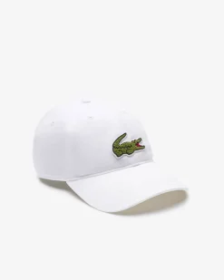 Berretto Lacoste bianco con frontino e maxi coccodrillo verde ricamato