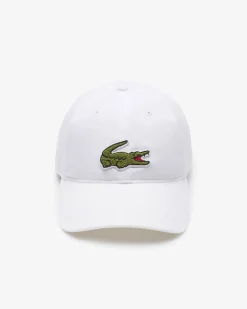Berretto Lacoste bianco con frontino e maxi coccodrillo verde ricamato