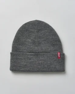 Berretto Levi's grigio con risvolto e piccola etichetta rossa porta logo