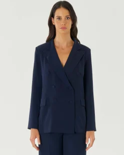 Blazer doppiopetto color blu in crêpe con revers a lancia