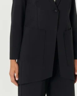 Blazer nero midi in tricotina di misto viscosa con fondo asimmetrico stondato