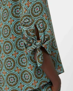 Blusa color acqua Weekend Max Mara a fantasia marrone con fiocchi sulle maniche tre quarti