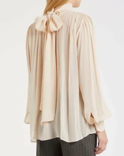 Blusa Marella rosa cipria in georgette di viscosa con collo alto e fiocco sul retro e maniche lunghe a sbuffo