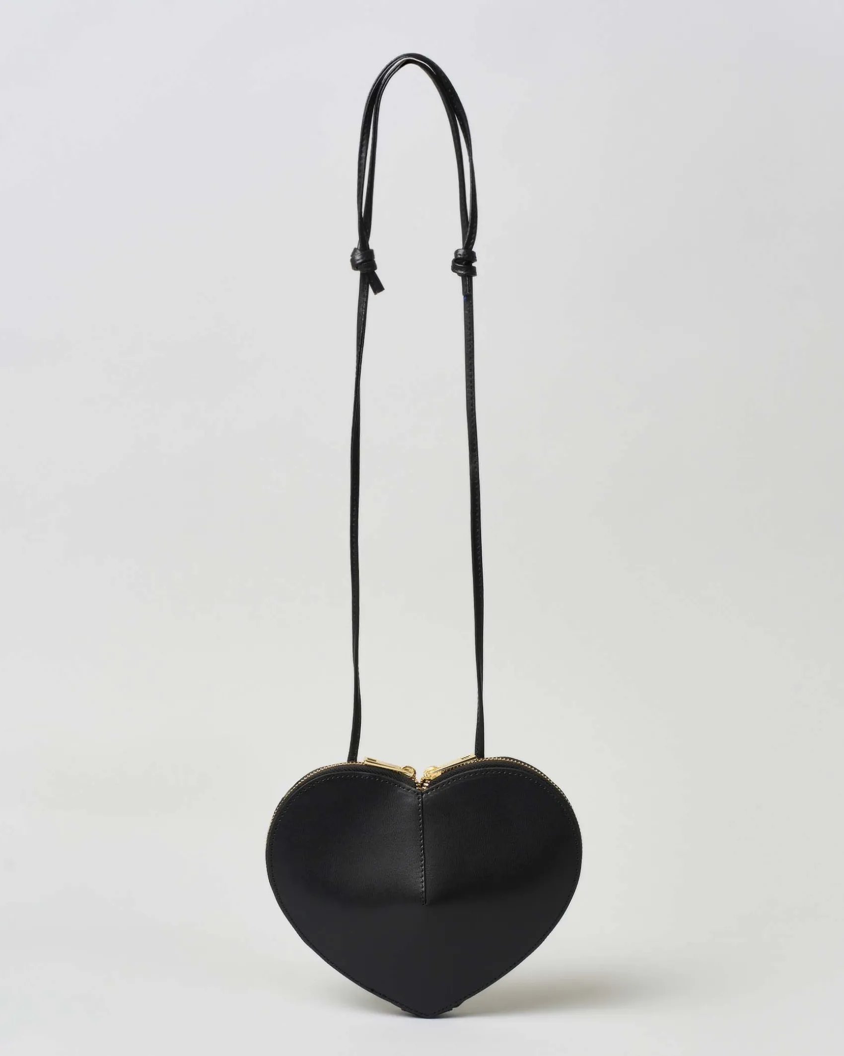 Borsa a cuore nera in pelle liscia con tracolla regolabile e doppia cerniera