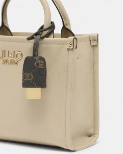 Borsa a mano Liu Jo Accessories beige effetto rilievo con charm logo