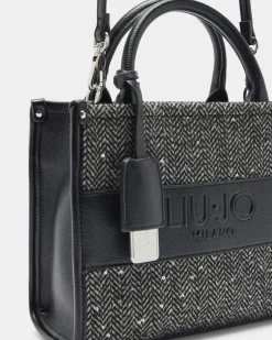 Borsa a mano Liu Jo Accessories nera in tessuto chevron con paillettes