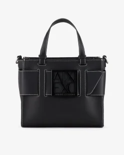 Borsa a mano misura mini in similpelle nera con impunture bianche e maxi fibbia logo a specchio tono su tono