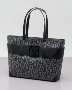Borsa a mano nera misura piccola in similpelle con scritta gesso logo all over con maxi fibbia logo a specchio tono su tono