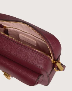 Borsa a tracolla bordeaux Coccinelle Beat Soft Small in pelle con tasca esterna e chiusura a girello