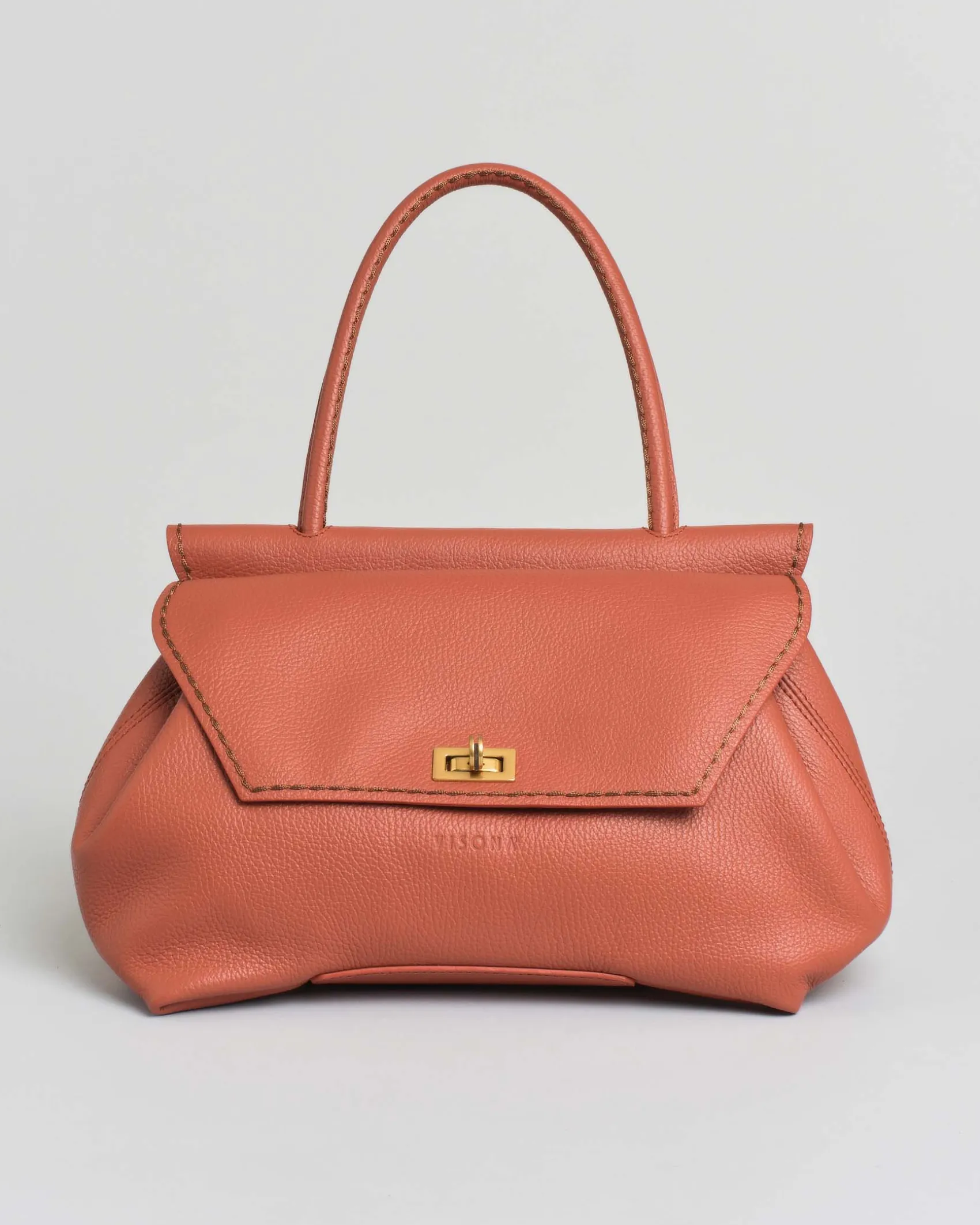 Borsa arancione Visonà in pelle martellata con patta squadrata e manico tubolare