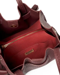 Borsa bordeaux Visonà misura piccola in pelle martellata con inserto abbinato a nodi e impunture a contrasto