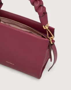 Borsa Coccinelle Boheme Small in pelle bordeaux con manico intrecciato