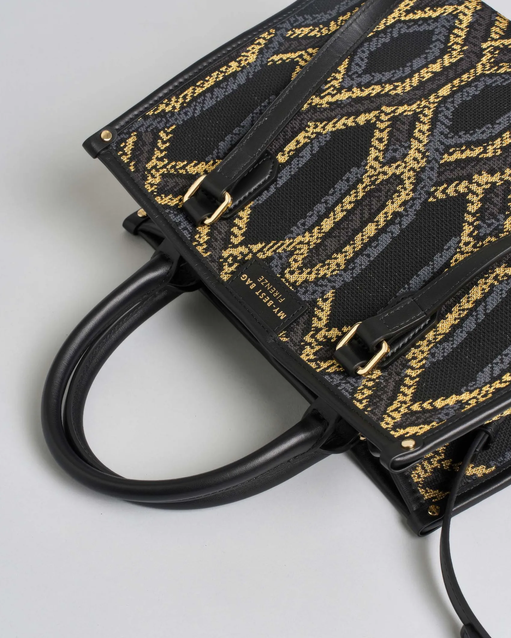 Borsa media My Best bag nera in tessuto intrecciato a motivo jacquard geometrico grigio e oro