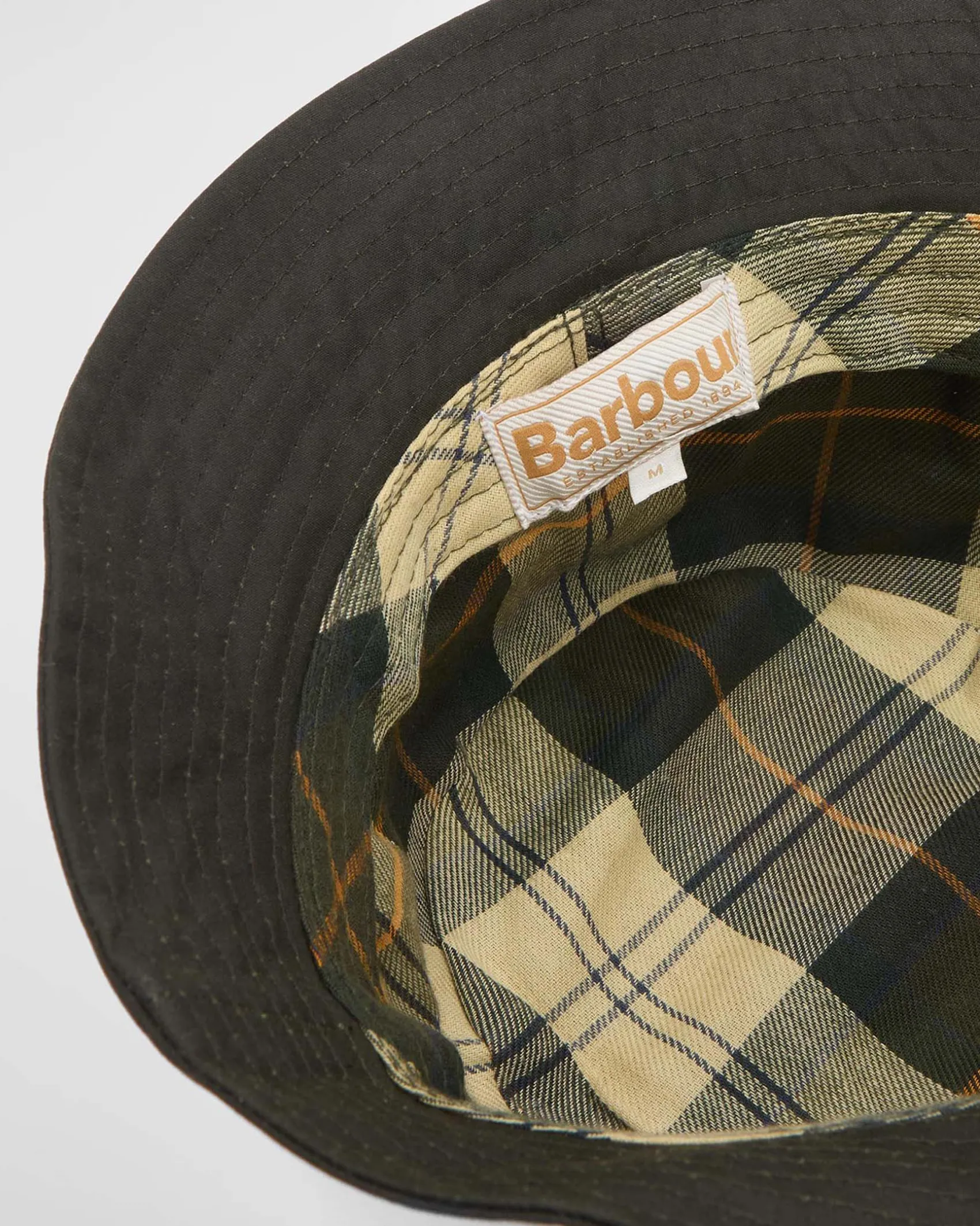 Bucket hat Besleay Barbour verde oliva in cotone cerato con fodera interna a fantasia tartan