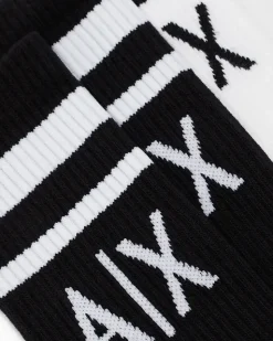 Calzettoni in cotone a coste neri e bianchi con logo jacquard a contrasto
