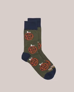 Calzino verde militare e blu in grafica bolli arancio con scritta Peace Love Music e Snoopy
