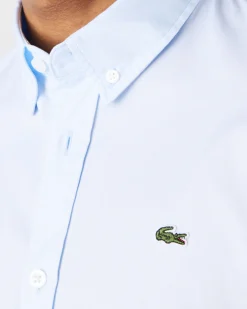 Camicia Lacoste azzurra in Oxford di puro cotone con collo button down