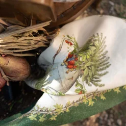 Canovaccio in lino arancione con riquadro avorio e stampa annaffiatoio piante aromatiche