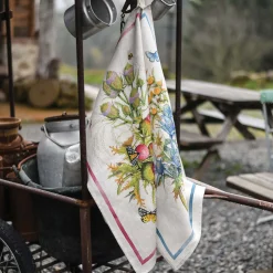 Canovaccio in lino bianco con stampa fiori di carciofo multicolore con riquardo blu