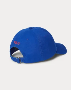 Cappellino blu royal in cotone con logo ricamato sul frontino a contrasto di colore