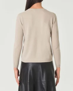 Cardigan beige girocollo in puro cashmere con chiusura a bottoni tono su tono