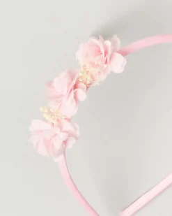 Cerchiello rosa con applicazione floreale