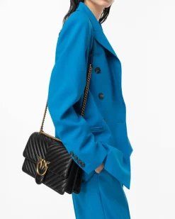 Classic Bag Chevron in pelle nera con fibbia Love Birds dorata e tracolla a catena regolabile