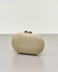 Clutch ovale color oro con strass applicati all over e chiusura a scatto a sfera