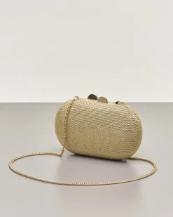 Clutch ovale color oro con strass applicati all over e chiusura a scatto a sfera