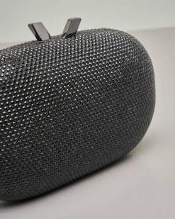 Clutch ovale con strass color nero applicati e chiusura a scatto