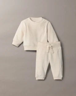 Completo Calvin Klein maglia e pantalone color panna a costine in ciniglia