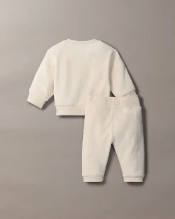 Completo Calvin Klein maglia e pantalone color panna a costine in ciniglia