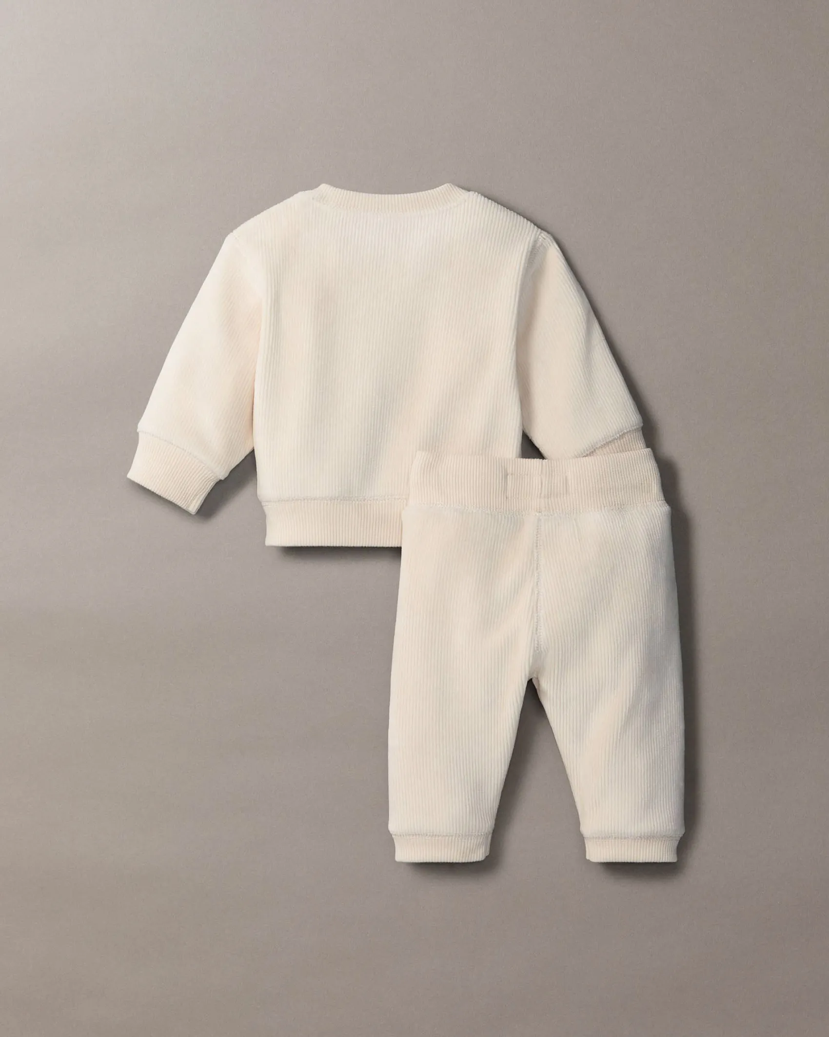 Completo Calvin Klein maglia e pantalone color panna a costine in ciniglia