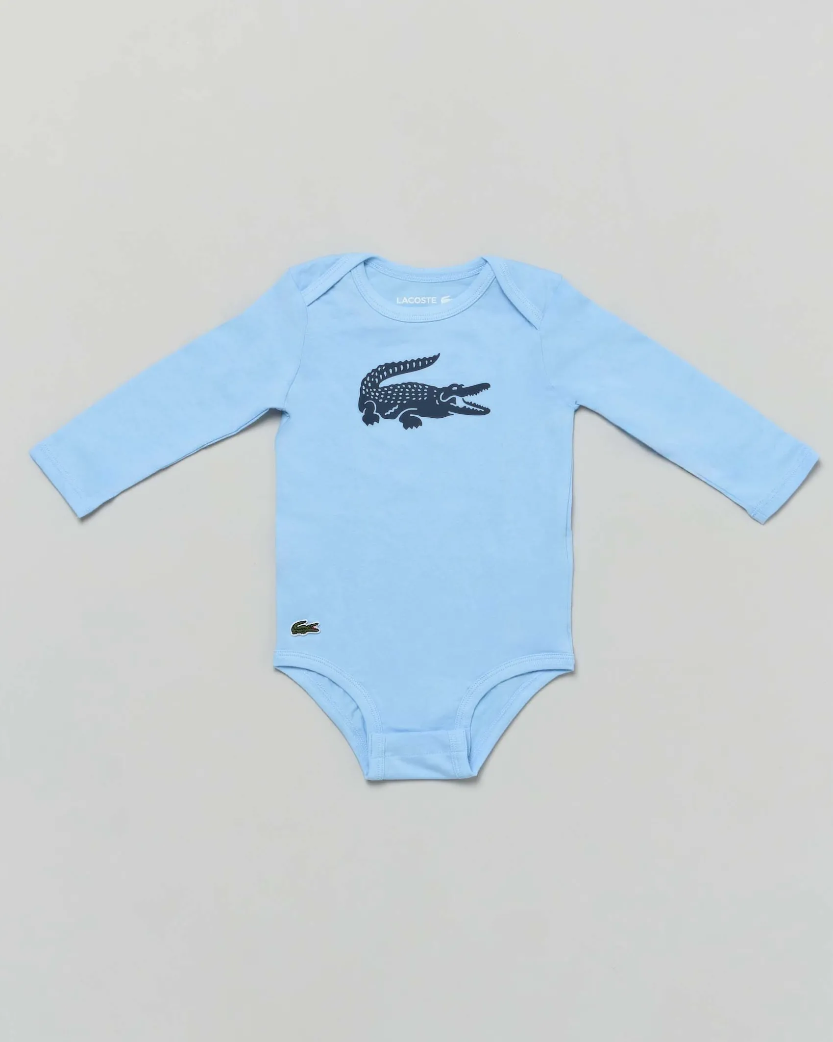 Completo Lacoste felpa e pantalone blu con body bianco