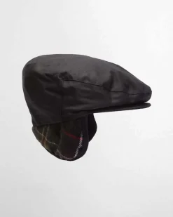 Coppola Barbour nera in cotone cerato con paraorecchie in tartan check