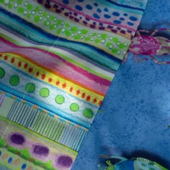 Copripiumino Beetles Izylinen double face a una piazza in cotone azzurro a stampa scarabei e righe multicolore