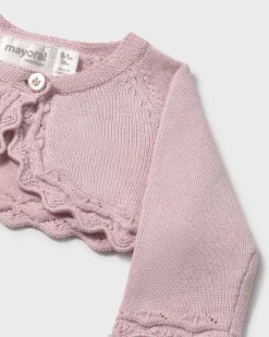 Coprispalle rosa antico con profili a merletto