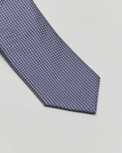 Cravatta blu con micro fantasia in pura seta